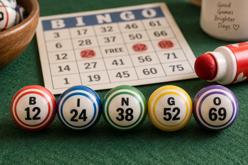 Bingo balls B12, I24, N38, G52 and O69 on green felt beside a bingo card.